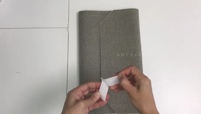 Stitch Velcro to the right side of the fabric (twice around).