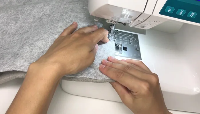 Backstitch, remove pins, and trim edges.