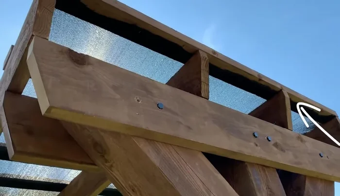 Drill a hole for the lag eye bolt (10-inch) at about 4 feet 8 inches off the ground to hang the hammock.