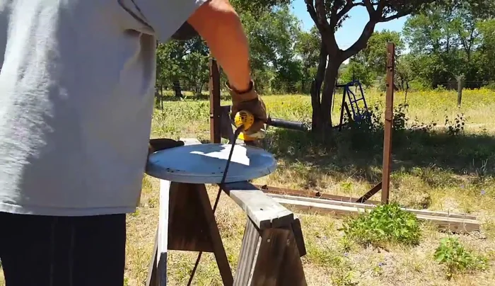 Attach the drum lid to the clock base using screws.