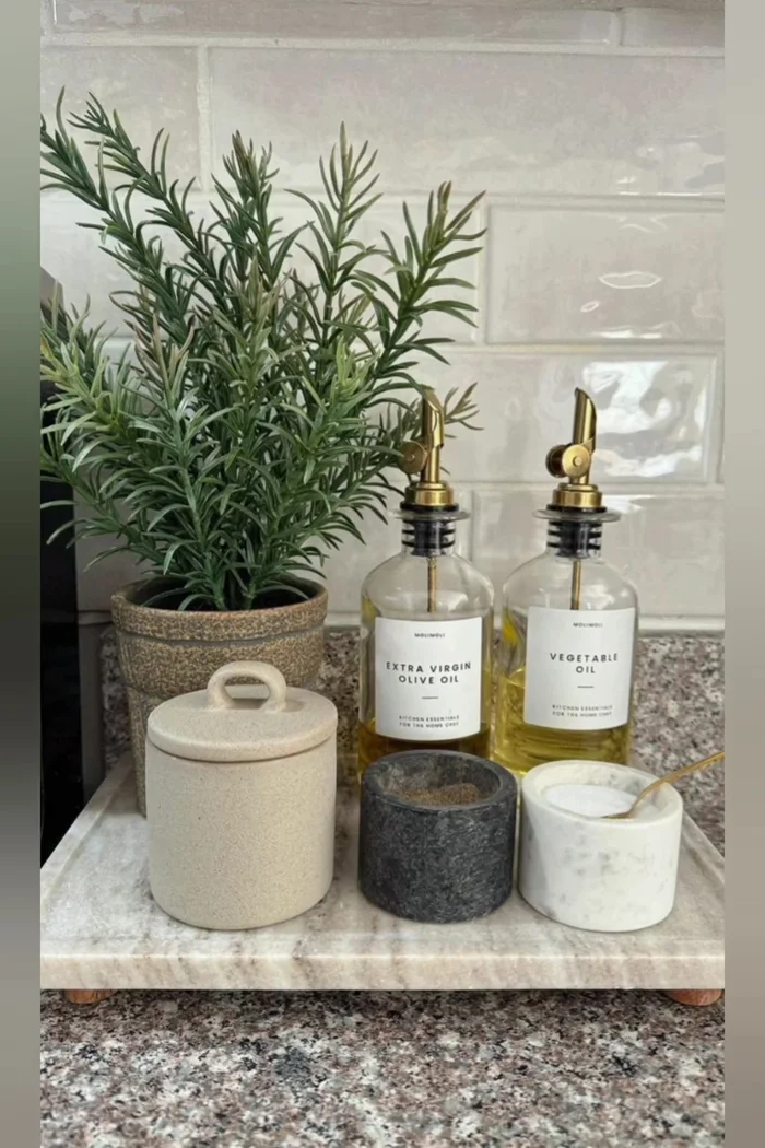 Use lighting to highlight décor: Incorporate small lamps or under-cabinet lighting to highlight decorative items and create an inviting atmosphere.