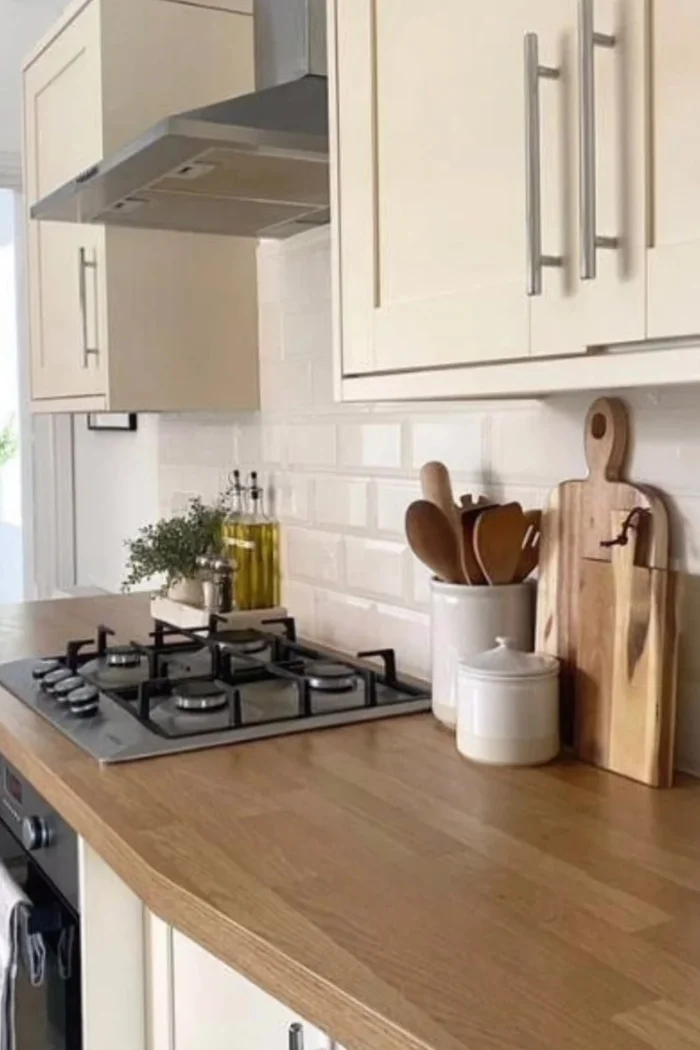 Utilize a hanging system: Hang items like spice racks or coffee service to keep things organized and add elegance.