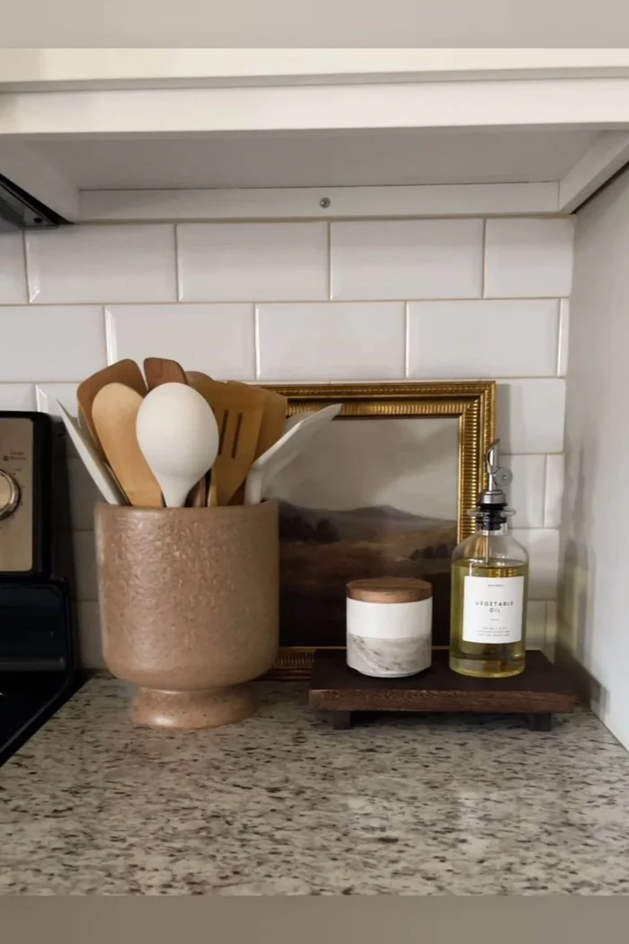 Use interesting elements: Use coasters, open baskets, or other items to subtly add visual interest.