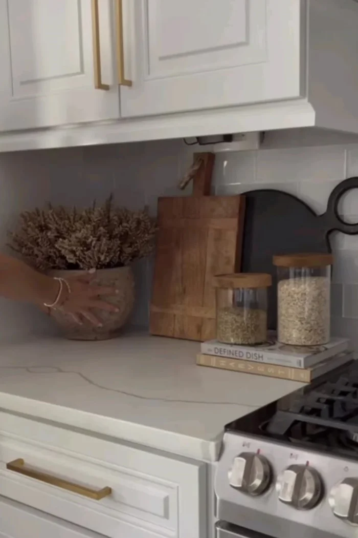 Utilize a hanging system: Hang items like spice racks or coffee service to keep things organized and add elegance.