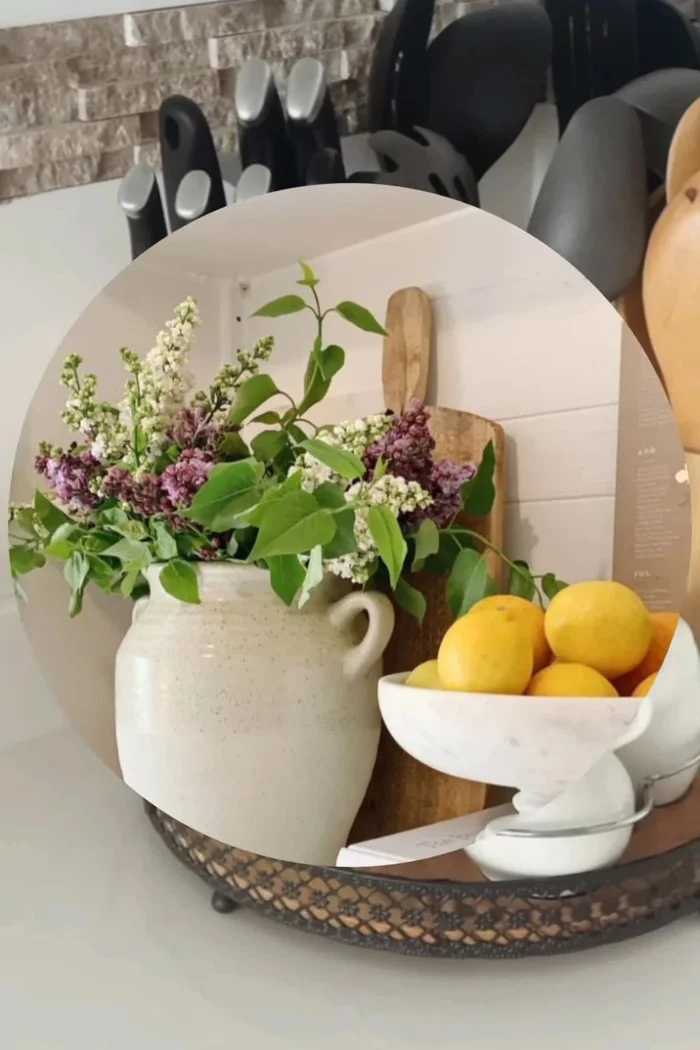 Incorporate symmetry and balance: Use symmetry and balance to create a visually appealing arrangement. For example, place plants on either side of the stove.