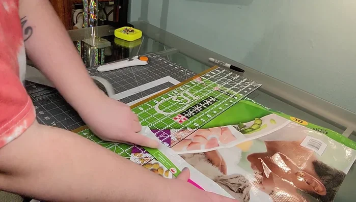 Straight stitch down the center of the folded strap to secure it.