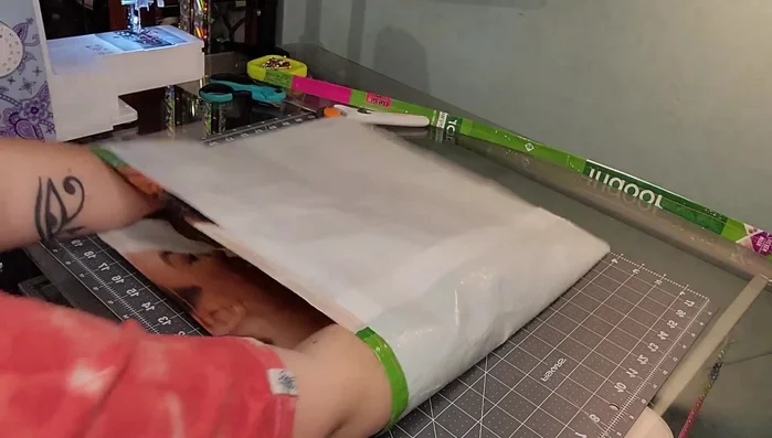 Reinforce the bottom corners by opening up the triangle seam, flattening it, and drawing a line across to sew that section.