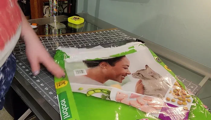 Straight stitch down the center of the folded strap to secure it.