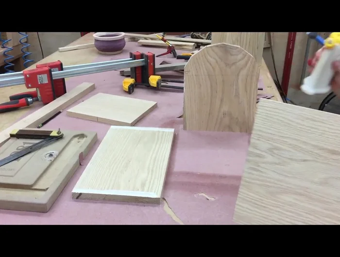 Sand the box, starting with a belt sander, then a random orbit sander, finishing with 220-grit sandpaper.