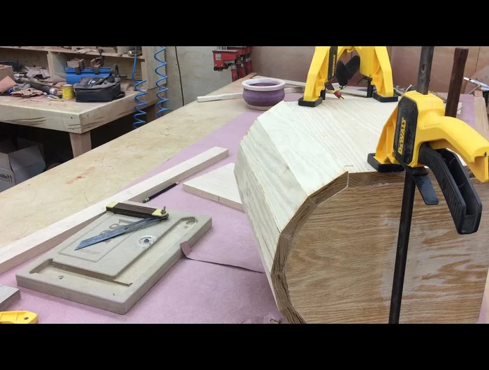 Sand the box, starting with a belt sander, then a random orbit sander, finishing with 220-grit sandpaper.