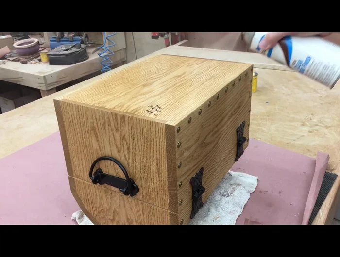 Apply four coats of satin lacquer finish, sanding between coats (400 to 2000 grit).