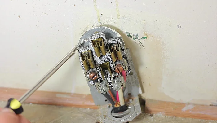 Loosen the screws holding the wires to the outlet (75% is enough).