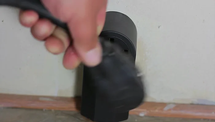 Double-check for electricity using a voltage meter.