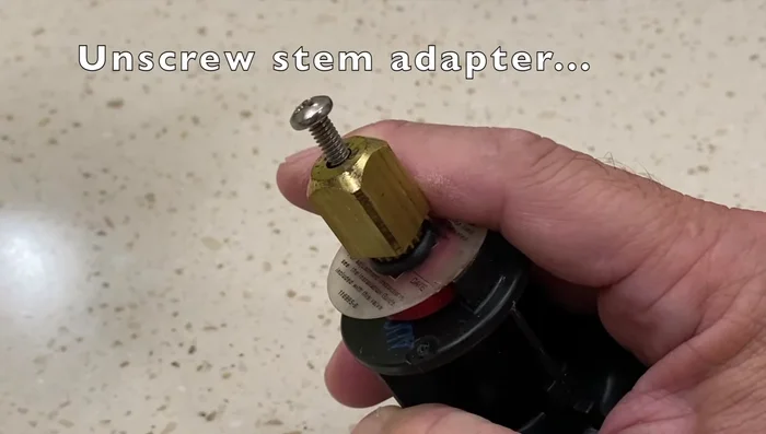 Install the stem adapter onto the new cap.