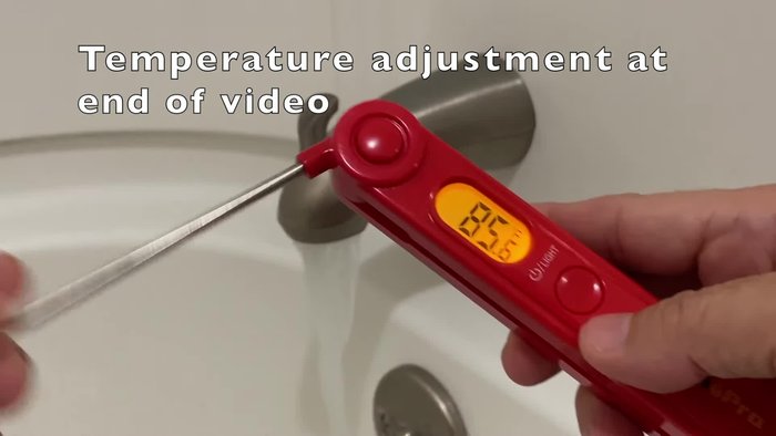 Close the drain or cover with a towel.