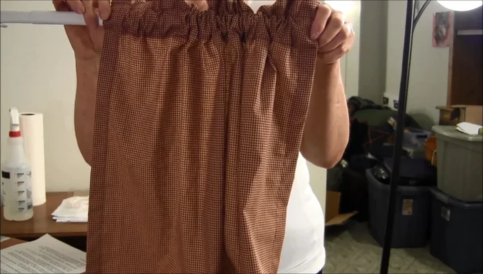 Measure from rod top to desired length, add 6 inches for hems and ruffle.