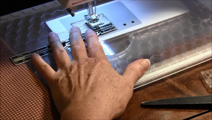 Sew 1 inch down from the top edge to create the ruffle and rod pocket. Use masking tape as a sewing guide if needed.