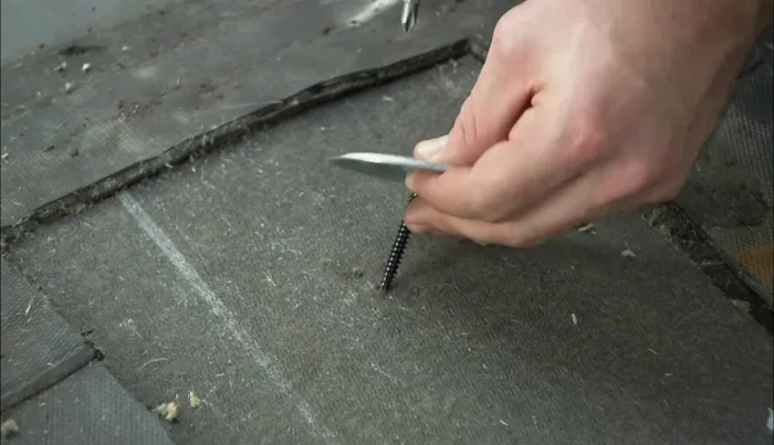 Install the new substrate piece using screws.