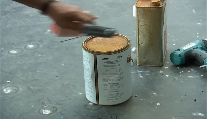 Apply rubber cement to the roof and half of the patch, let dry.