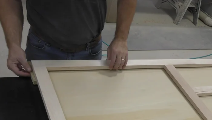 Layout for the cabinet body, using the cabinet bottom and spacer blocks to set the spacing for the finished ends.