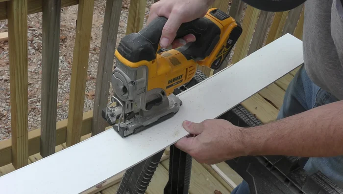 Install quarter-round baseboard on toe kick.