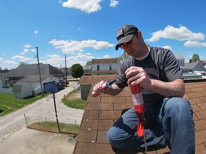 Prepare the roof sealant. Puncture the sealant tube using the caulking gun's puncture tool. Be careful to avoid getting sealant on your hands.