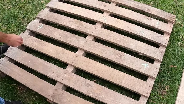 Reattach slats to both pallets.