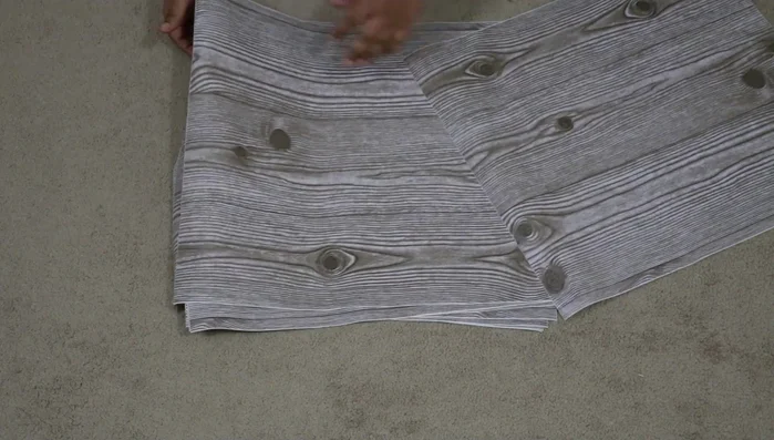 Cover cardboard with contact paper (or paint): This adds durability and aesthetics. Leave some areas unglued for better glue adhesion later.