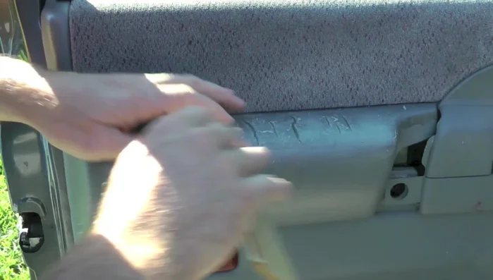 Mask off the surrounding area to protect it from adhesive spray.