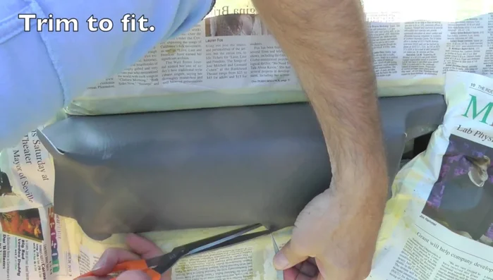 Wrap excess vinyl around to hide the seam at the top, trim and achieve a clean finish.