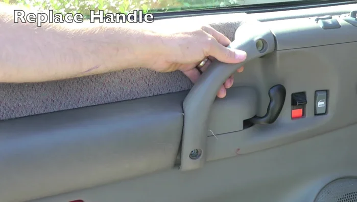 Remove masking tape and paper. Reattach the door handle.