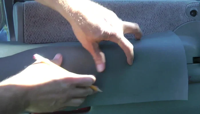 Cut wedges in the vinyl to allow for wrapping around corners.