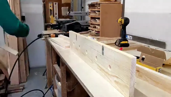 Assemble the molding: Attach the molding pieces to the 1x6 using wood glue and brad nails.