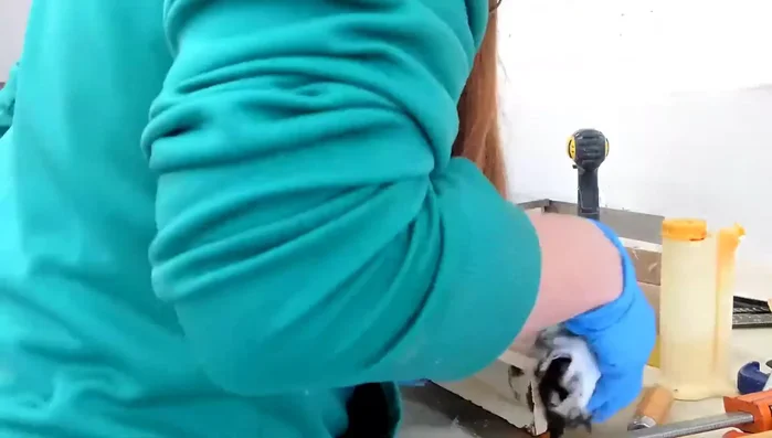 Apply stain and distress: Apply stain as a base coat, then dry brush white paint onto the wood for a distressed look.