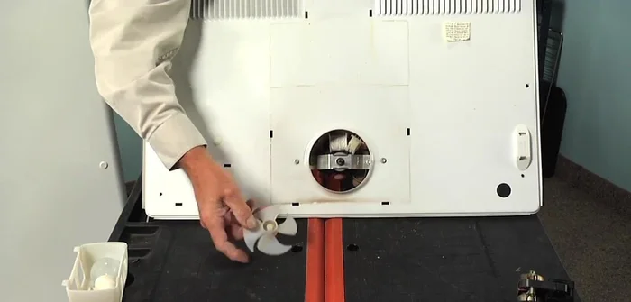 Reattach the fan blade.