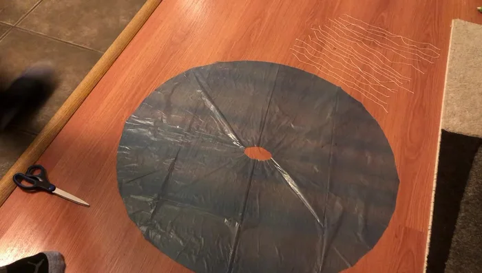 Tie all 15 parachute strings together into a single knot near the top.