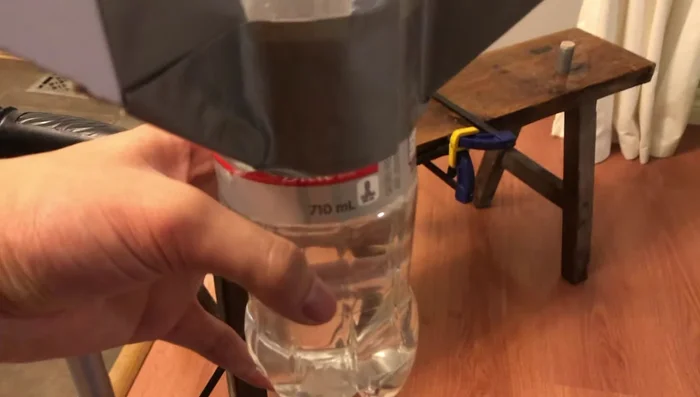Fill the bottle (partially) with water and attach to the launcher. Pump air until the rocket launches.