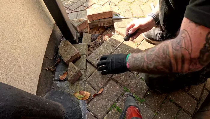 Use the reference photo to ensure correct block placement.