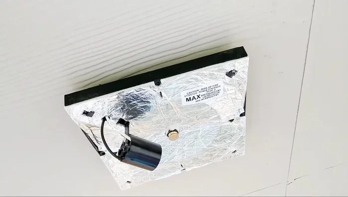 Turn off the power breaker to the light fixture.