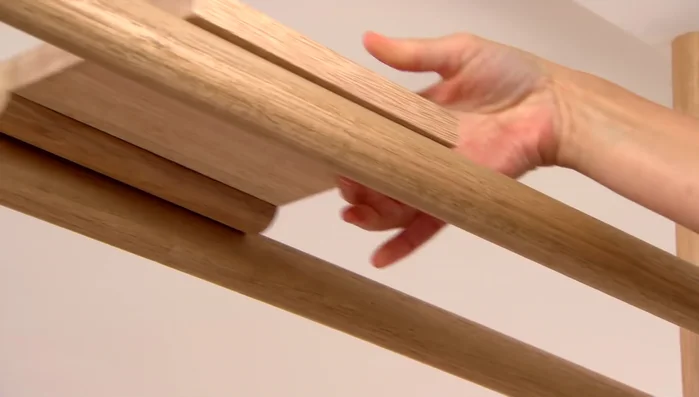 Install small shelves for plants using meranti or maple wood and half-round dowels.