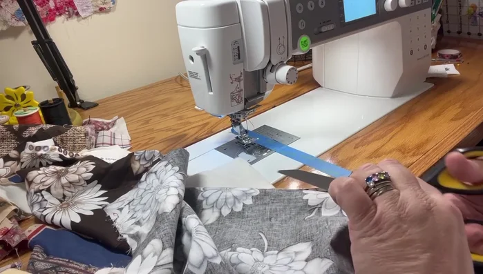 Trim excess fabric from the edges.