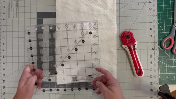 Cut batting 1 inch smaller than your backing.