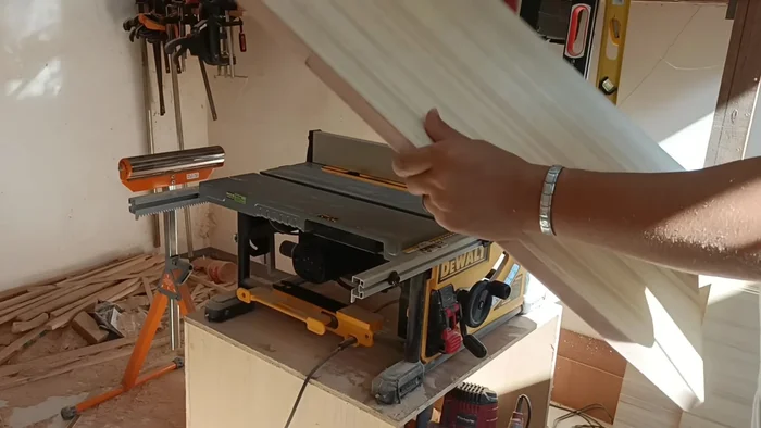 Ensure the wardrobe body is level before attaching it to the wall using screws.