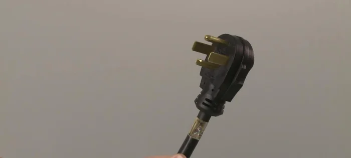 Remove the screw to release the grounding connection.