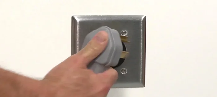 Plug in the new power cord and confirm that the dryer is functioning properly.