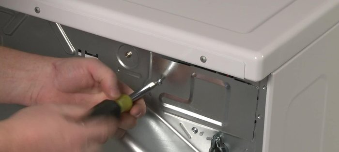 Remove the screw to release the grounding connection.
