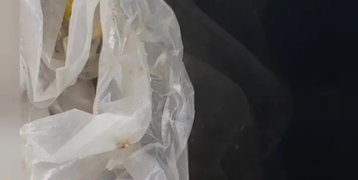 Fill a 5-gallon bucket with hot water. Submerge the end of the PEX pipe (connected to the bilge pump) in the bucket.