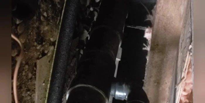 Turn on the bilge pump. The pump will recirculate the hot water through the PEX pipe, melting the ice in the water line. You may need to add more hot water to the bucket.