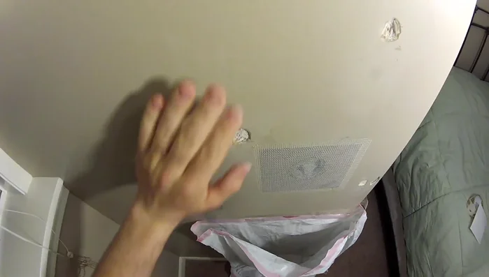 Sand the dried joint compound smooth. Remove dust.