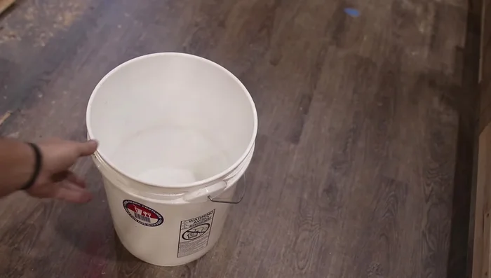 If necessary, use pliers or a nail puller to remove any remaining nail fragments.